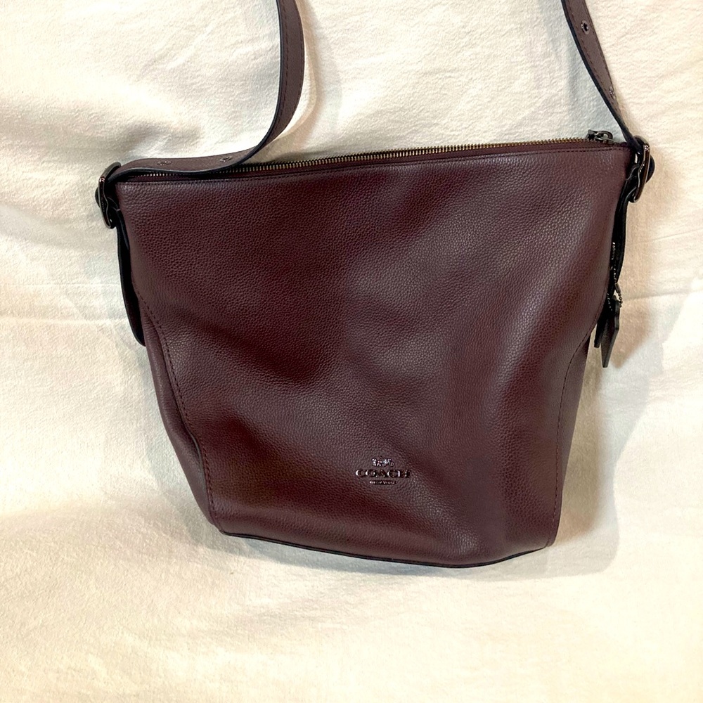Coach duffelette in ox blood